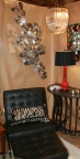 Curtis Jere "Raindrops" metal sculpture with lucite chandelier and black leather Barcelona chair with ottoman