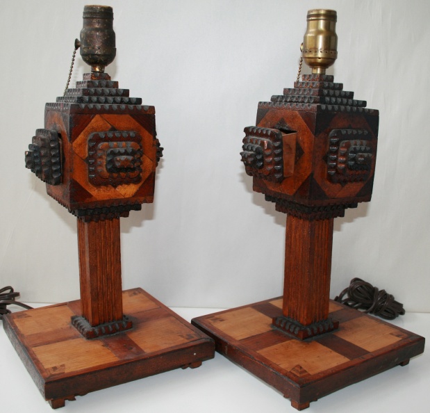 SOLD - Pair of carved tramp art lamps, each with a small drawer