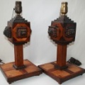 SOLD - Pair of carved tramp art lamps, each with a small drawer