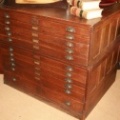 SOLD - Antique circa 1900 oak 11 drawer map / file cabinet with all original hardware and nicely detailed paneled sides.