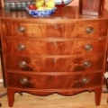 American Federal (1790) mahogany bow front chest of 4 drawers with string inlay details on graceful bracket legs.