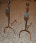 Antique hand wrought iron andirons with movable heart elements