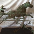Early copper weathervane horse with sulky, rider and directionals