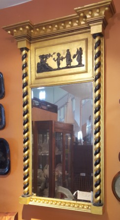 Antique Empire gold framed mirror with black accent