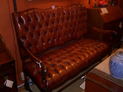Vintage Tufted Leather Settee with Lovely Turned Walnut Legs 