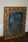Antique ornate repousse brass framed mirror