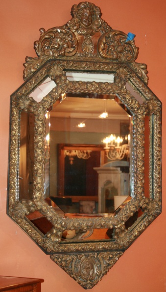 Multi-faceted octagonal mirror with elegant detail and shape