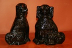 Pair of antique Staffordshire Spaniel dogs in rare Jackfield glaze