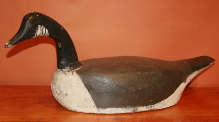 Antique carved wooden goose decoy in original paint