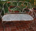 Hand wrought iron bench in the double heart design