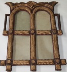 Finely carved tramp art four section frame