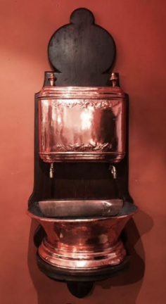 French Lavabo - Traditionally a lavabo would be used for washing hands before dining. The upper tank held the fresh water and the lower basin caught the water. Today these lovely antique pieces are hung on the wall as a decorative planter or fountain.  
