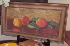 Early oil painting of peaches, in a frame
