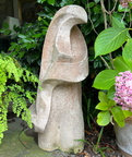 Gracefully hand-carved stone sculpture, simple and contemporary, this lovely timeless piece deserves a special place in your beautiful garden. Measures approximately 36" high x 16" wide x 8" deep.