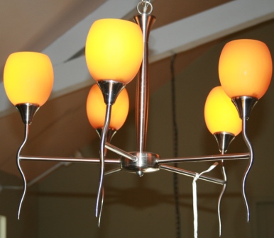 Mid-century five arm chrome chandelier with golden colored glass globes